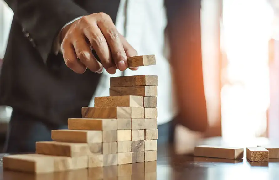 Gregory Law Firm attorney guiding a Northwest Arkansas buyer through a business acquisition across Bentonville, Rogers, Fayetteville, and Siloam Springs